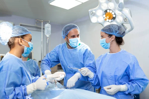 Diverse Team Professional Surgeon Assistants Nurses Performing Invasive Surgery Patient — Foto Stock