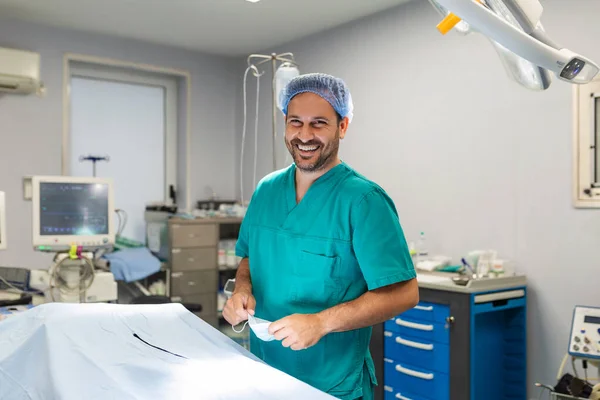 Portrait Male Surgeon Operation Theater Looking Camera Showing Gesture Doctor Stock Picture