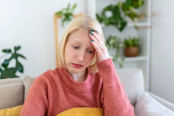 Portrait Young Blond Woman Sitting Couch Home Headache Migraine Beautiful —  Fotos de Stock