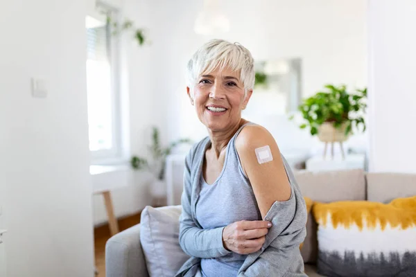 Woman Pointing Her Arm Bandage Receiving Covid Vaccine Mature Woman — Stock Photo, Image