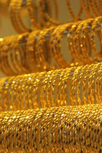 Złote bransoletki — Zdjęcie stockowe