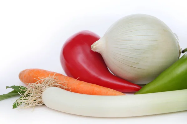 Healthy vegetables for health. White onion, capia pepper, green pepper, mint, carrot and leek.