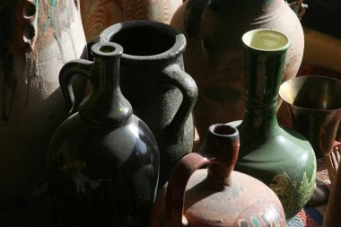 old earthenware pots in the antique shop