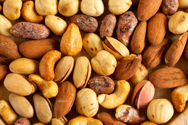 Various Nuts Healthy Snacks Food Background — Stockfoto