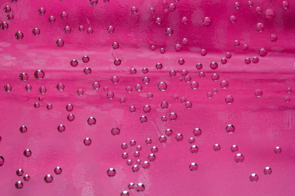 Close Water Drops Pink Background — Zdjęcie stockowe