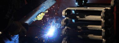 metal welding worker at factory