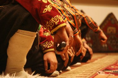 Men in folkloric clothes in Konya Aksehir