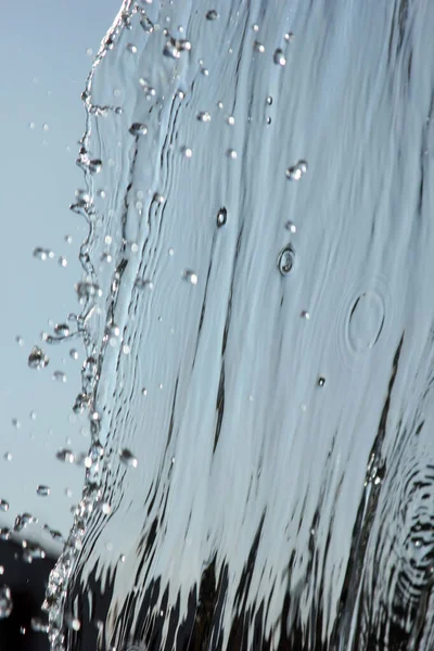 Splashing Water Blue Background — Zdjęcie stockowe