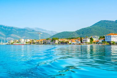 Tivat, Montenegro - July 16, 2022: Picturesque waterfront in Tivat on the shore of the Bay of Kotor - Boka Bay