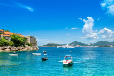 Budva, Montenegro - July 22, 2022: Beautiful  summer landscape of the Adriatic coast in The Budva Riviera with a view of the Sveti Stefan, Montenegro