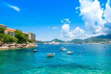 Budva, Montenegro - July 22, 2022: Beautiful  summer landscape of the Adriatic coast in The Budva Riviera with a view of the Sveti Stefan