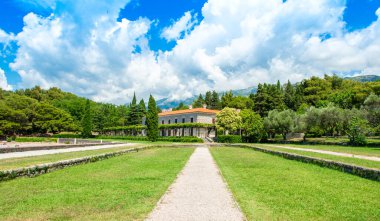 Panoramic landscape with the former summer residence Villa Milocer overlooks the Adriatic Sea with beautiful green Royal park