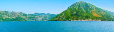 Beautiful summer landscape of the Bay of Kotor coastline - Boka Bay with view to old town of Perast, Montenegro
