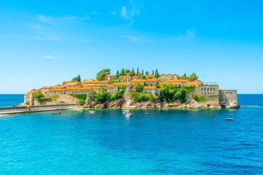 Budva, Montenegro - June 24, 2022: Beautiful  summer landscape of the Adriatic coast in The Budva Riviera with a view of the Sveti Stefan