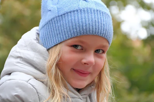 Beautiful girl with blond hair and blue eyes — Stock Photo, Image