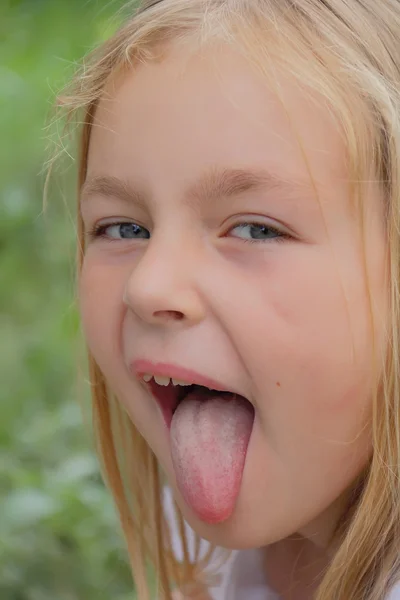 Girl makes faces — Stock Photo, Image