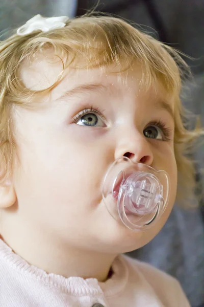 Cute infant with nipple — Stock Photo, Image