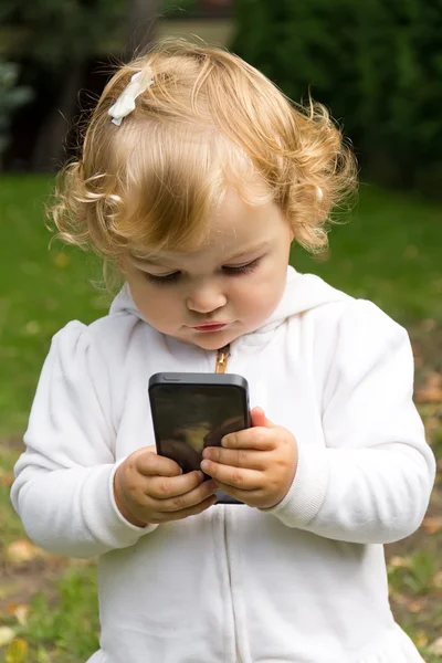 Cute infant with cellular — Stock Photo, Image