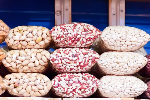 Counter in market place with bean and nuts — Stock Photo, Image