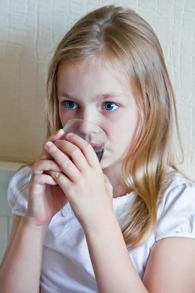 Cute girl drinking beverage — Stock Photo, Image