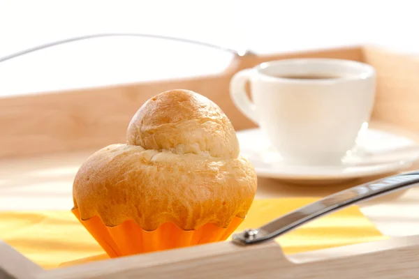 French Brioche and white cup of Coffee on background — Stock Photo, Image