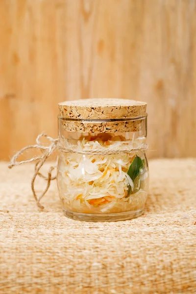 Sour cabbage - sauerkraut - in glass jar — Stock Photo, Image