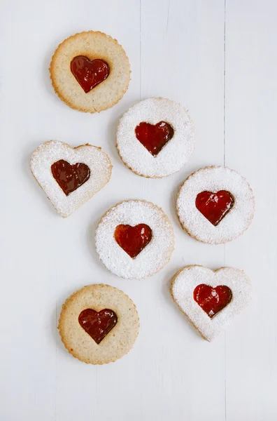 Linzer homemade cookies with heart shape raspberry jam window — Stock Photo, Image