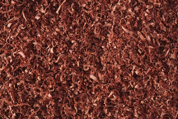 Fine grated chocolate background — Stock Photo, Image