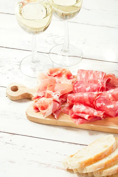 Platter of serrano jamon Cured Meat and ciabatta — Stock Photo, Image