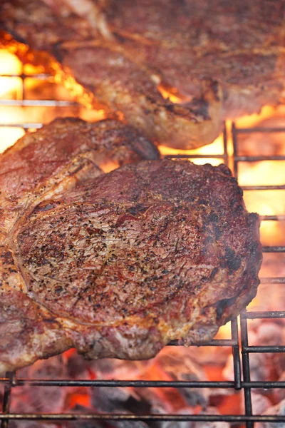 Food meat - rib eye beef steak on party summer barbecue grill wi — Stock Photo, Image