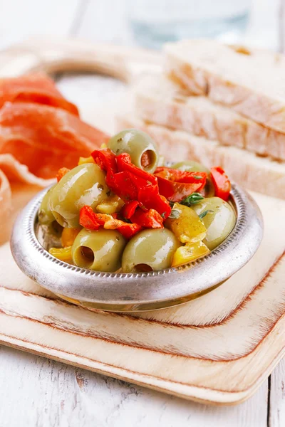 Platter of olives, serrano jamon Cured Meat, Ciabatta — Stock Photo, Image