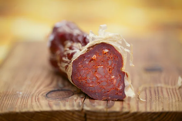 Espanhol fino jamon chouriço salsicha, rasa dof — Fotografia de Stock