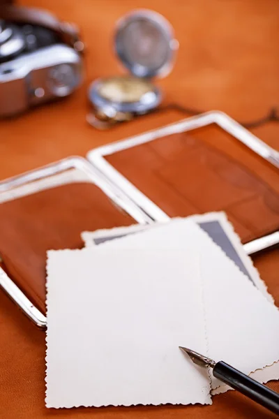 Vintage photographs with  old wallet, watch and camera — Stock Photo, Image