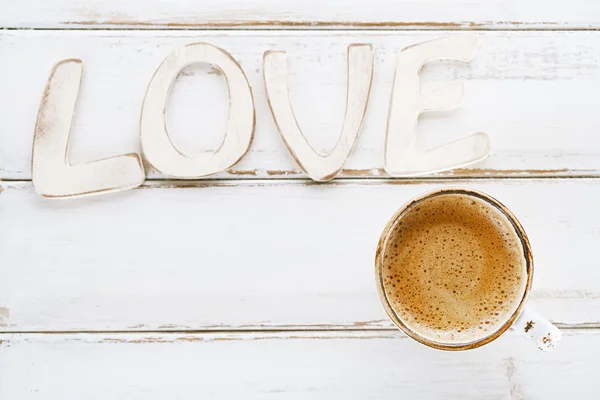 LOVE sign letters with espresso coffee — Stock Photo, Image