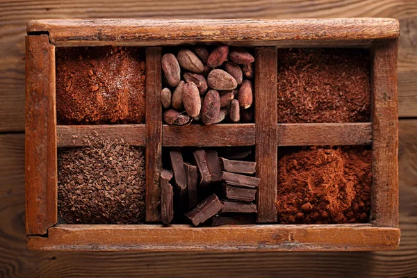 Old spicy box full of chocolate — Stock Photo, Image