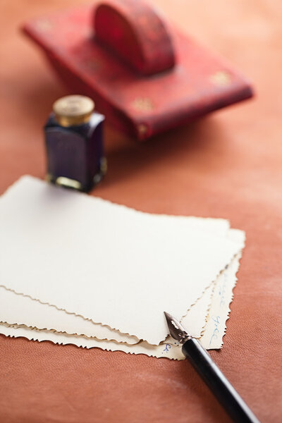 vintage red leather ink blotter  with retro post cards on leathe