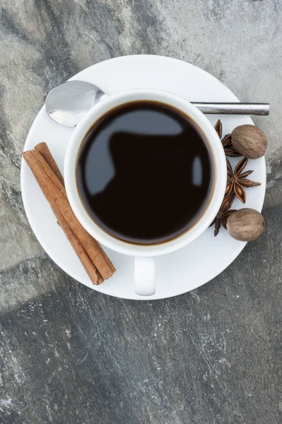 Coffee cup and saucer birds eye view on rustic slate background — Stock Photo, Image