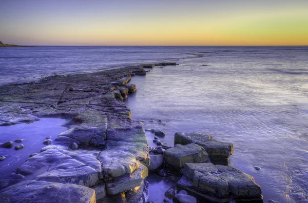 Táj seascape élénk téli naplemente hosszú expozíció — Stock Fotó