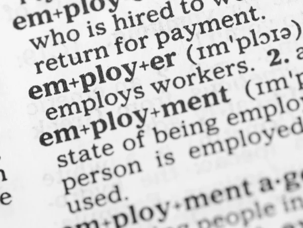Macro imagen del diccionario definición de empleo —  Fotos de Stock