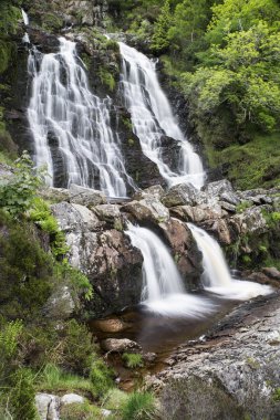 Rhiwargor Waterfall landscape in Snowdonia National Park during clipart
