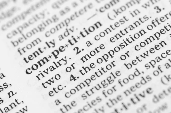 Macro foto van het woordenboekdefinitie van concurrentie — Stockfoto