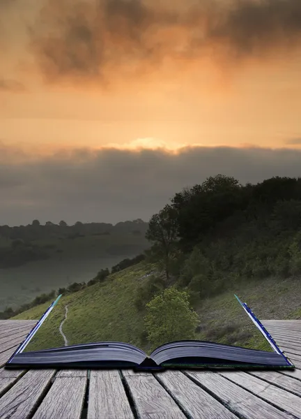 Creative concept pages of book Vibrant sunrise over countryside — Stock Photo, Image