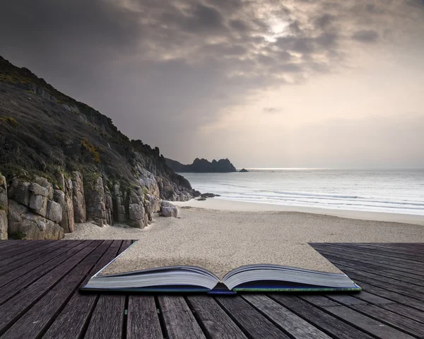 Creative concept pages of book Porthcurno yellow sand beach befo