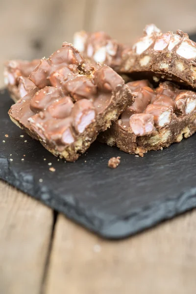 Rustic background with rocky road dessert squares — Stock Photo, Image