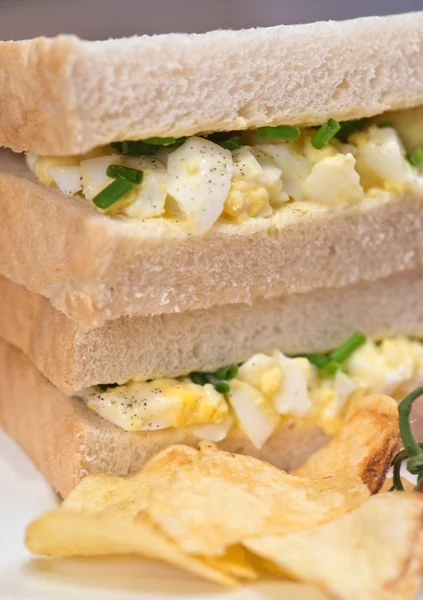 Fresh egg on white sandwich in rustic kitchen setting — Stock Photo, Image