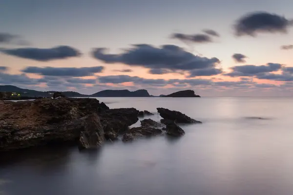 Sunrise over rocky coastline on Meditarranean Sea landscape in S — Stock Photo, Image