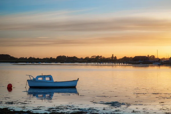 Landscape tranquil harbour at sunset with yachts in low tide — Stock Photo, Image