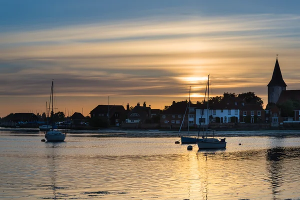 Landscape tranquil harbour at sunset with yachts in low tide — Stock Photo, Image