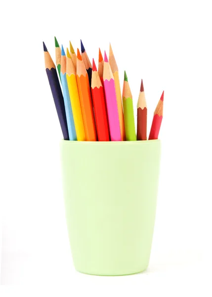 Farverige blyanter i en kop - Stock-foto