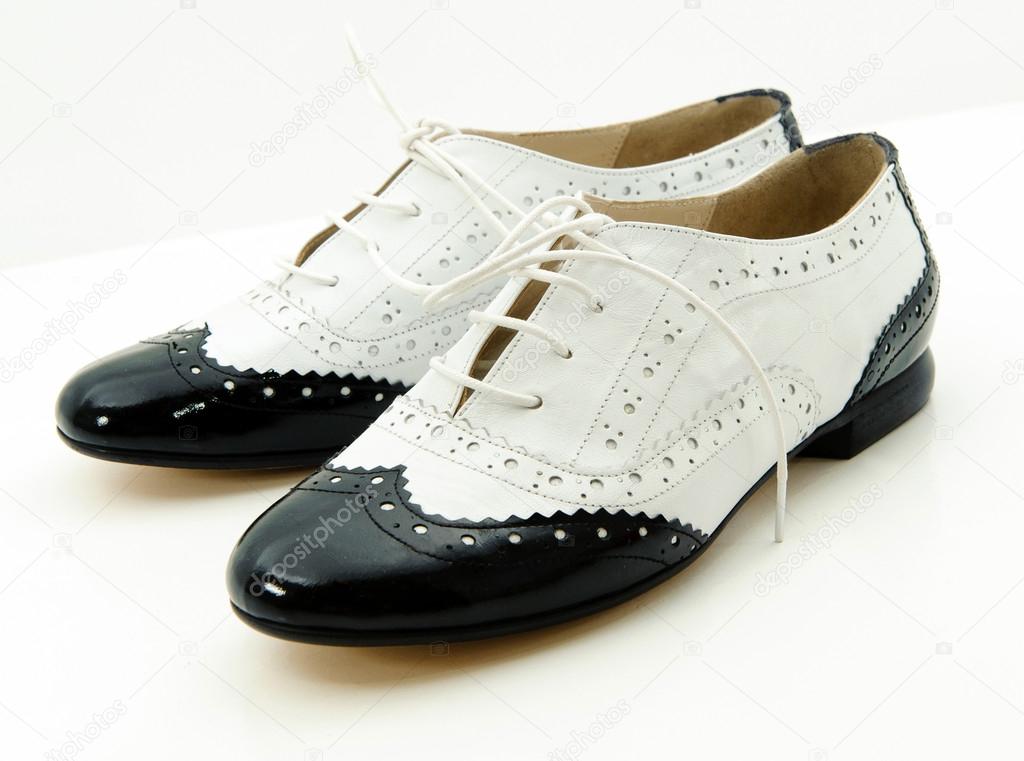 Black and white gangster shoes on a white background